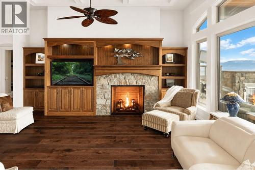 *Virtually enhanced to show white walls. - 954 Hewetson Avenue, Kelowna, BC - Indoor Photo Showing Living Room With Fireplace