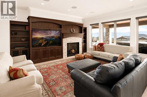 *Virtually enhanced to show white walls. - 954 Hewetson Avenue, Kelowna, BC - Indoor Photo Showing Living Room With Fireplace