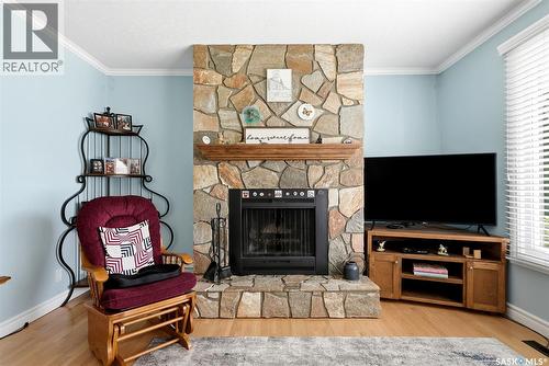 60 Gardiner Avenue, Regina, SK - Indoor Photo Showing Living Room With Fireplace