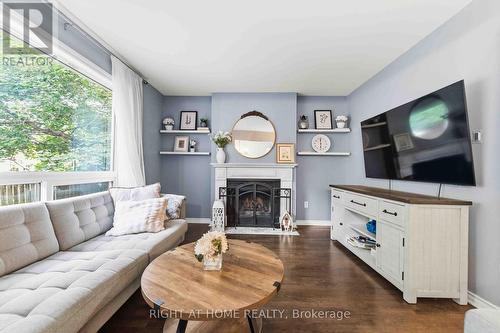 25 Waterton Crescent, Ottawa, ON - Indoor Photo Showing Living Room With Fireplace
