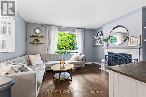 25 Waterton Crescent, Ottawa, ON - Indoor Photo Showing Living Room With Fireplace