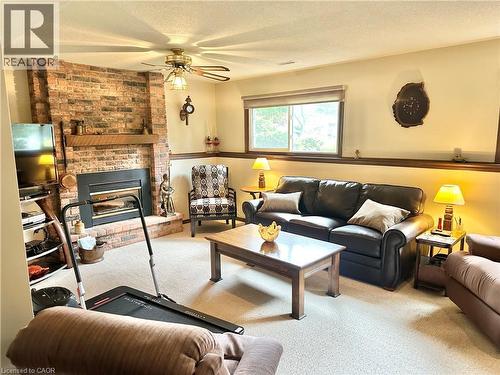 Family Room - 44 Douglas Avenue, Simcoe, ON - Indoor Photo Showing Living Room With Fireplace