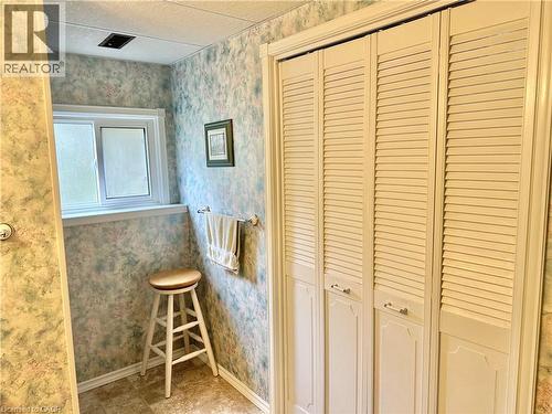 Lower Level Bathroom -walk in shower in corner and behind the doors is the laundry room - 44 Douglas Avenue, Simcoe, ON - Indoor Photo Showing Other Room