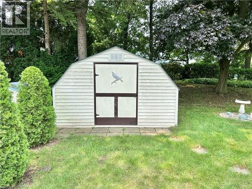 Gable-roof storage shed with horizontal siding and double doors - 44 Douglas Avenue, Simcoe, ON - Outdoor