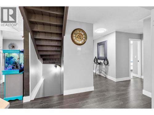 Stairway to lower level from main floor - 3341 Broadview Road, West Kelowna, BC - Indoor Photo Showing Other Room