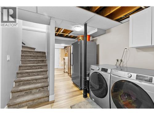 Main house laundry area - 3341 Broadview Road, West Kelowna, BC - Indoor Photo Showing Laundry Room