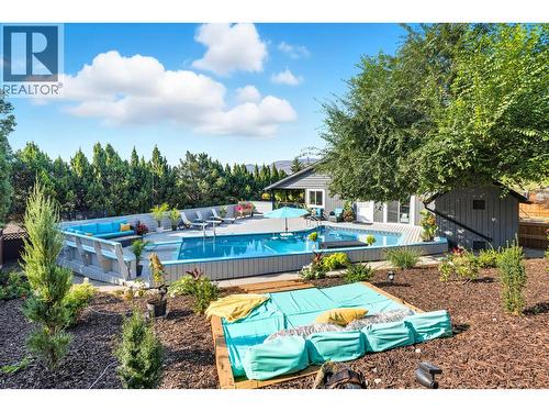 Lounge area above pool - 3341 Broadview Road, West Kelowna, BC - Outdoor With In Ground Pool