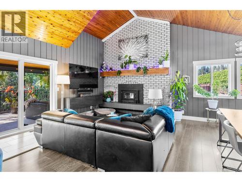 Oversized living room - 3341 Broadview Road, West Kelowna, BC - Indoor Photo Showing Living Room With Fireplace