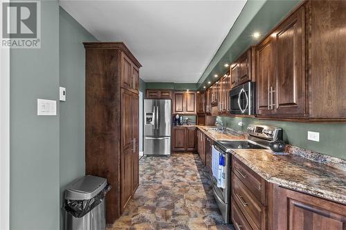 255 Corporal Jamie Murphy Drive, Conception Harbour, NL - Indoor Photo Showing Kitchen With Double Sink