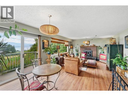 3812 Albrecht Road, Naramata, BC - Indoor Photo Showing Living Room With Fireplace