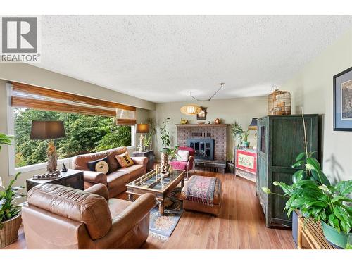 3812 Albrecht Road, Naramata, BC - Indoor Photo Showing Living Room With Fireplace