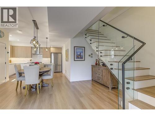 Open-concept design connects the kitchen, dining and living areas - 747 Patterson Avenue Unit# 2, Kelowna, BC - Indoor Photo Showing Dining Room