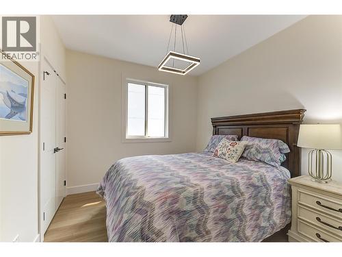 Bright upper-level bedroom - 747 Patterson Avenue Unit# 2, Kelowna, BC - Indoor Photo Showing Bedroom