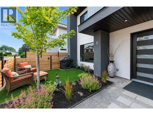 A welcoming walkway leads through the private front yard to your front door - 747 Patterson Avenue Unit# 2, Kelowna, BC - Outdoor With Deck Patio Veranda With Exterior