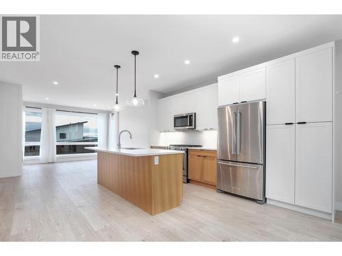 Main Floor - 1839 Grey Owl Court, Kelowna, BC - Indoor Photo Showing Kitchen With Upgraded Kitchen