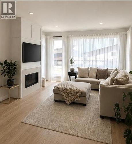 1839 Grey Owl Court, Kelowna, BC - Indoor Photo Showing Living Room With Fireplace