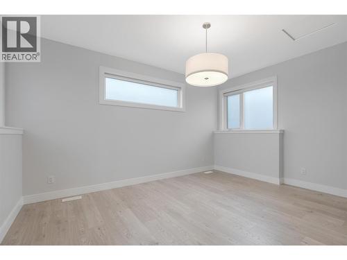 Primary Bedroom - 1839 Grey Owl Court, Kelowna, BC - Indoor Photo Showing Other Room
