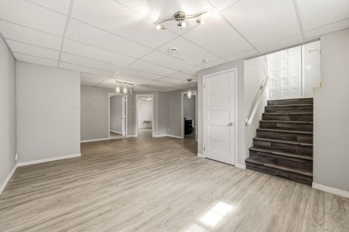 Salle familiale - 892 37E Rue B, Saint-Georges, QC - Indoor Photo Showing Other Room