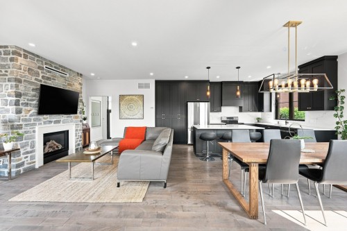Overall view - 48Z Boul. Des Mésanges, Saint-Charles-Borromée, QC - Indoor With Fireplace