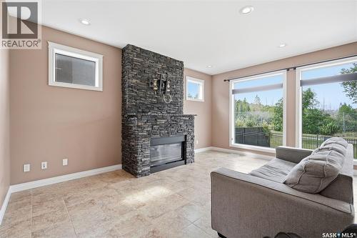 434 Atton Crescent, Saskatoon, SK - Indoor Photo Showing Living Room With Fireplace