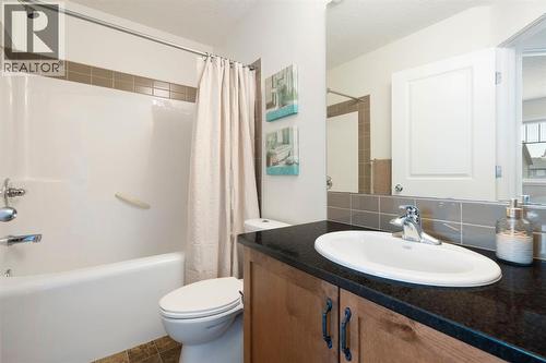 12 Fireside Burrow, Cochrane, AB - Indoor Photo Showing Bathroom
