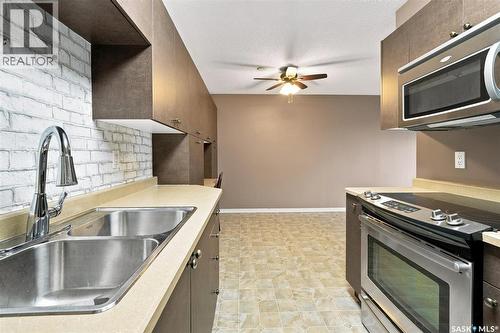 23 111 St Lawrence Crescent, Saskatoon, SK - Indoor Photo Showing Kitchen With Double Sink