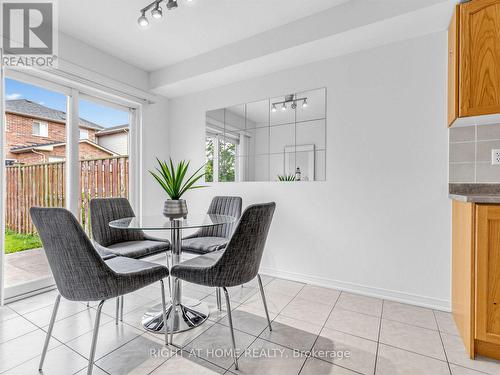 Breakfast area with walkout to backyard - 81 Briarcrest Drive, Markham, ON - Indoor Photo Showing Dining Room