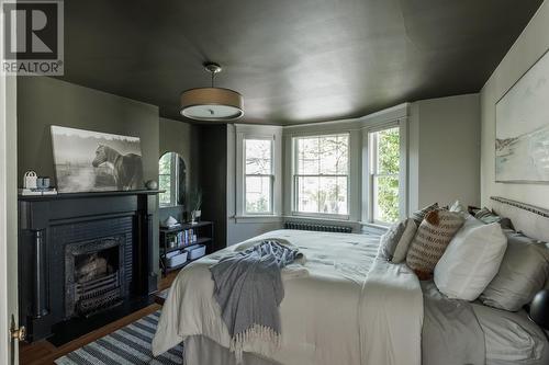 31 Craigmillar Avenue, St. John'S, NL - Indoor Photo Showing Bedroom With Fireplace