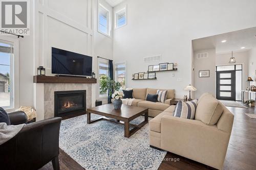 58 Carriage Crossing, Mapleton, ON - Indoor Photo Showing Living Room With Fireplace