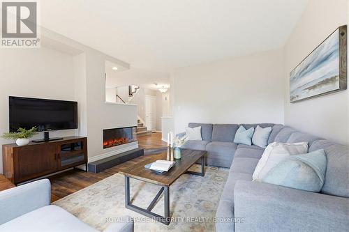 116 Springcreek Crescent, Ottawa, ON - Indoor Photo Showing Living Room With Fireplace