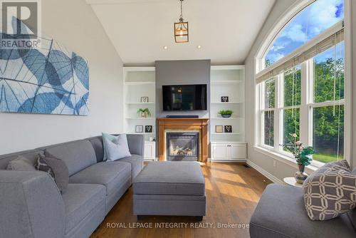 562 Pennycross Lane, Ottawa, ON - Indoor Photo Showing Living Room With Fireplace