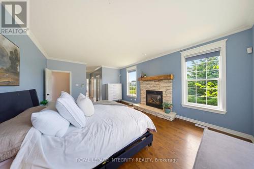 562 Pennycross Lane, Ottawa, ON - Indoor Photo Showing Bedroom With Fireplace