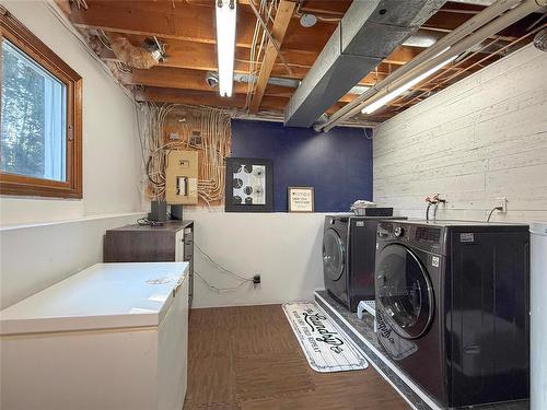 Laundry Room with Storage - 115 Mcvicar Crescent, Brandon, MB - Indoor Photo Showing Laundry Room