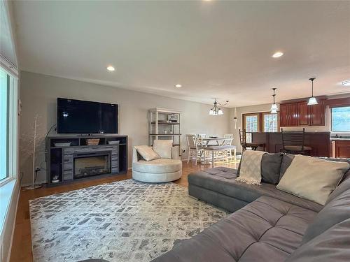 Hardwood Floors throughout Main Floor - 115 Mcvicar Crescent, Brandon, MB - Indoor Photo Showing Living Room