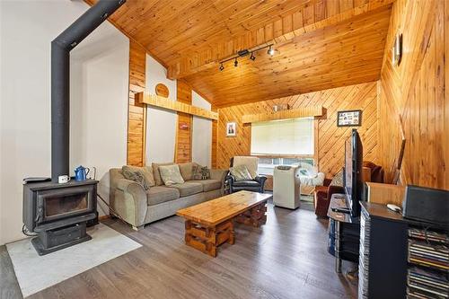 46 Ash St, Great Falls, MB - Indoor Photo Showing Living Room With Fireplace