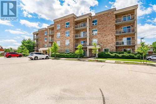 207 - 901 Paisley Road, Guelph (Willow West/Sugarbush/West Acres), ON - Outdoor With Balcony With Facade