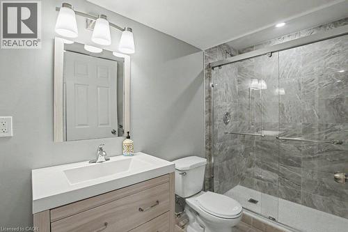 Basement bathroom with modern vanity/sink and glass enclosed tile finished shower - 568 Robert Ferrie Drive, Kitchener, ON - Indoor Photo Showing Bathroom