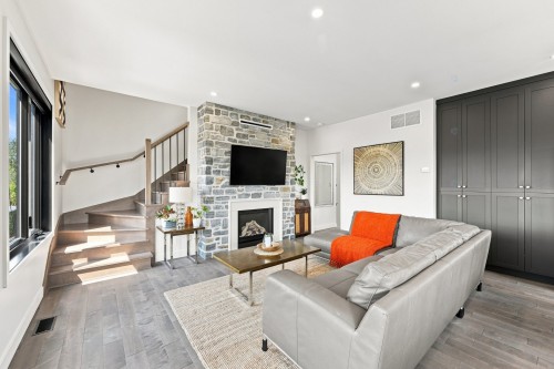 Living Room - 48 Boul. Des Mésanges, Saint-Charles-Borromée, QC - Indoor Photo Showing Living Room With Fireplace