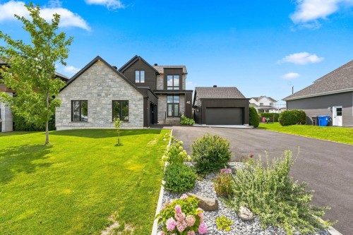 Front of Structure - 48 Boul. Des Mésanges, Saint-Charles-Borromée, QC - Outdoor With Facade