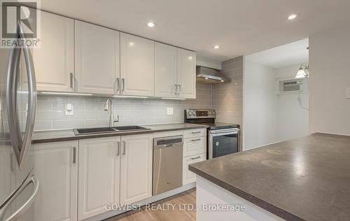 502 - 557 The East Mall, Toronto, ON - Indoor Photo Showing Kitchen With Double Sink