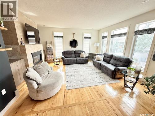 505 Brown Crescent, Weyburn, SK - Indoor Photo Showing Living Room With Fireplace