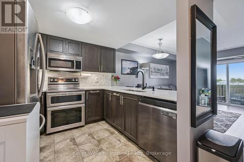 107 - 103 Westminster Crescent, Centre Wellington (Fergus), ON - Indoor Photo Showing Kitchen With Stainless Steel Kitchen With Upgraded Kitchen