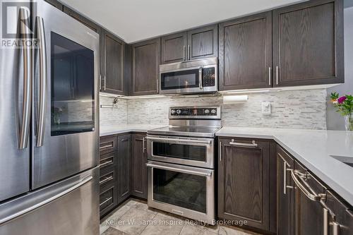 107 - 103 Westminster Crescent, Centre Wellington (Fergus), ON - Indoor Photo Showing Kitchen With Stainless Steel Kitchen With Upgraded Kitchen