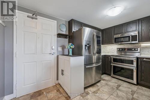 107 - 103 Westminster Crescent, Centre Wellington (Fergus), ON - Indoor Photo Showing Kitchen With Stainless Steel Kitchen