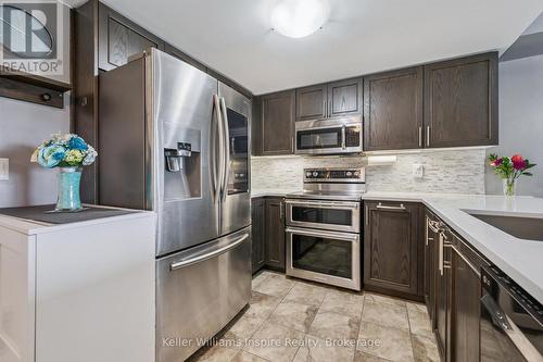 107 - 103 Westminster Crescent, Centre Wellington (Fergus), ON - Indoor Photo Showing Kitchen With Stainless Steel Kitchen With Upgraded Kitchen
