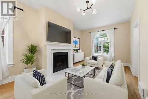Virtually staged - 284 Crichton Street, Ottawa, ON - Indoor Photo Showing Living Room With Fireplace