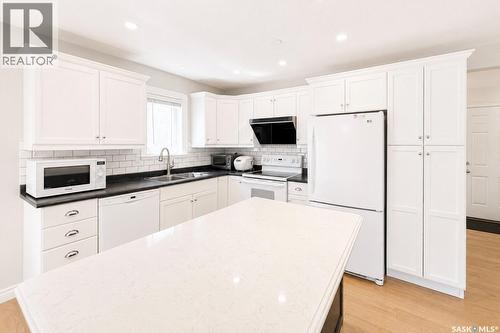 338 Stensrud Road, Saskatoon, SK - Indoor Photo Showing Kitchen With Double Sink