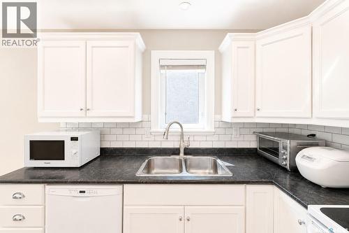338 Stensrud Road, Saskatoon, SK - Indoor Photo Showing Kitchen With Double Sink