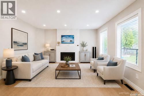 338 Stensrud Road, Saskatoon, SK - Indoor Photo Showing Living Room With Fireplace