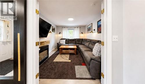 8 Blake, Little Current, ON - Indoor Photo Showing Living Room With Fireplace